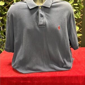 Stylish Navy Polo Shirt with Red Logo